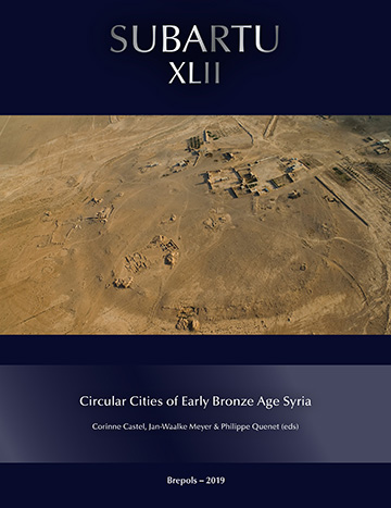 An aerial view of ruins of an ancient circular city