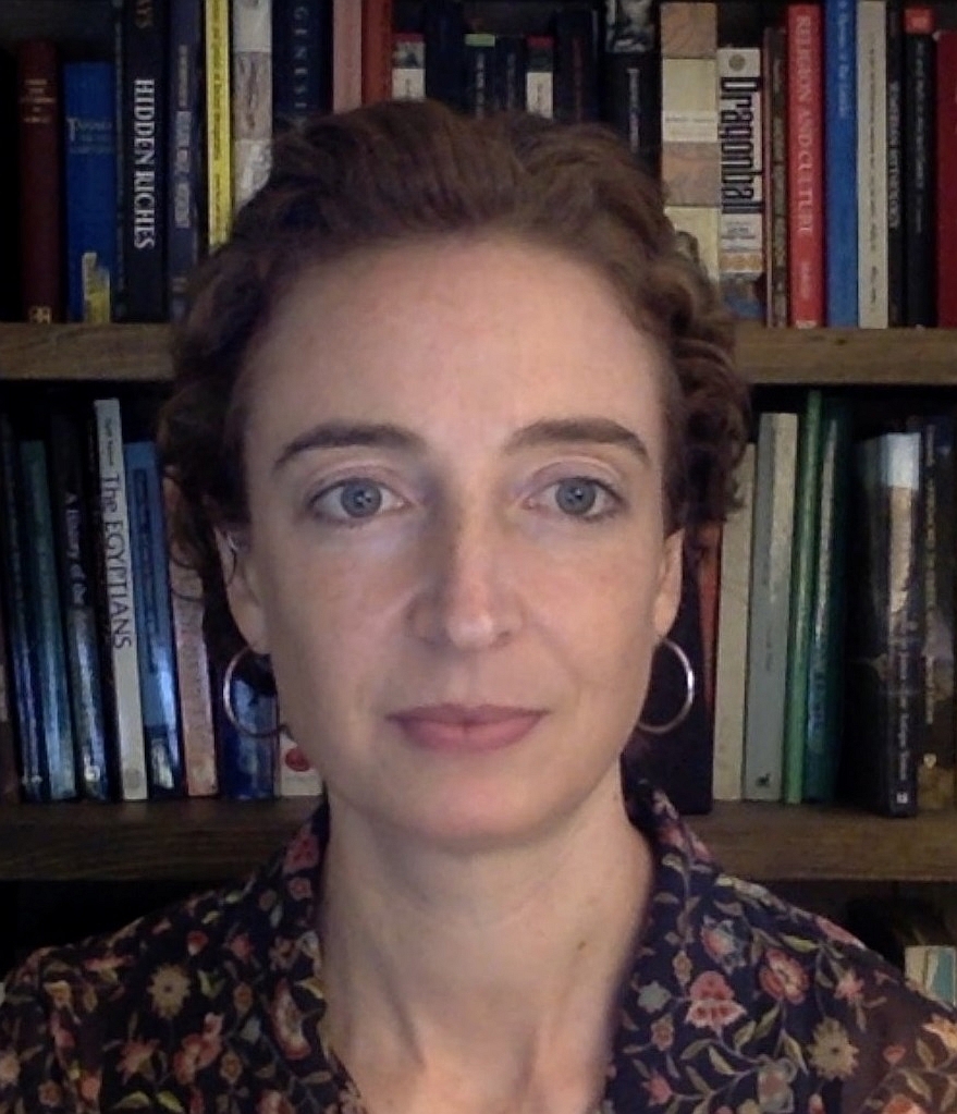 Dr. Kathryn Kelley in front of bookshelves