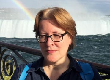 Professor Heather D. Baker in front of the Niagara Falls